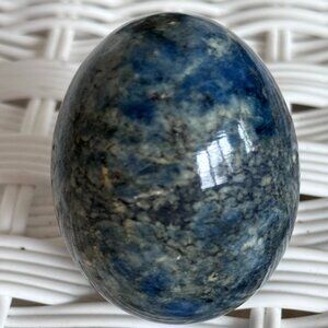 Natural stone coloration — not dyed. Each egg has unique veining and color varia